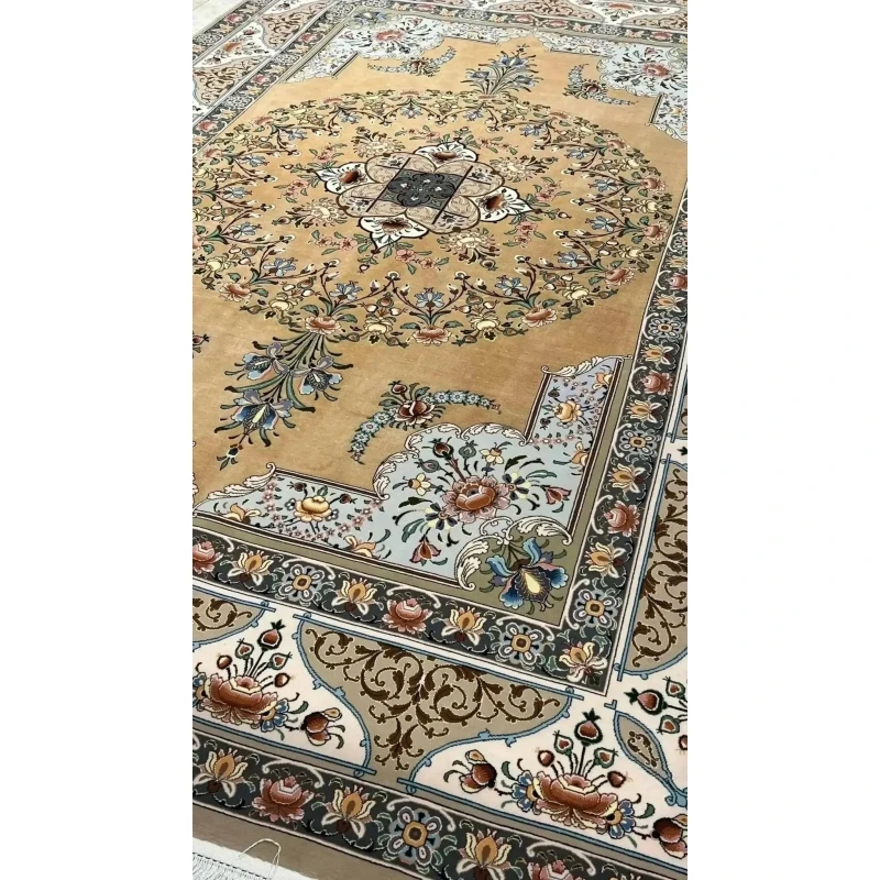 An expansive Isfahan rug showcasing intricate floral patterns and traditional craftsmanship