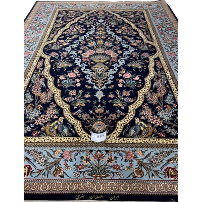 "Luxury hand-knotted Isfahan Persian rug featuring intricate floral and peacock motifs on a navy background."
