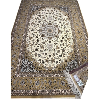 "Hand-knotted Islimi rug design from Isfahan, 225x145 cm, made by Weaver Aminie using wool and silk with intricate floral motifs."