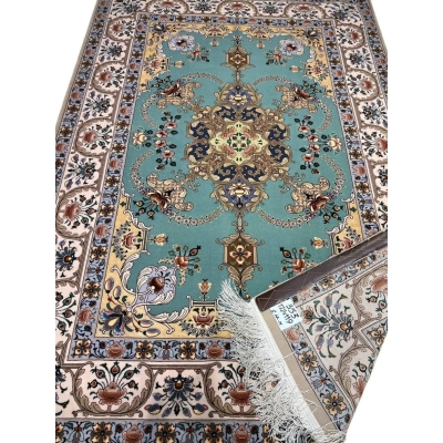 "Persian Isfahan rug with aqua green floral medallion design and ivory border, hand-knotted by Master Moaeidie."