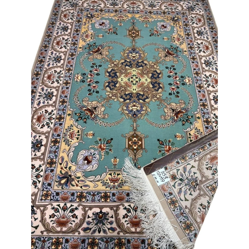 "Persian Isfahan rug with aqua green floral medallion design and ivory border, hand-knotted by Master Moaeidie."