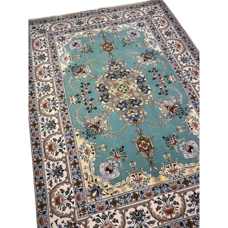"Exquisite Persian rug measuring 172 x 119 cm with hand-knotted silk and wool detailing."