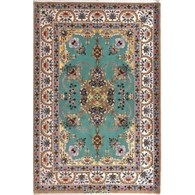 "Hand-knotted Persian Isfahan rug in blue and green, crafted by Master Moaeidie, measuring 172 x 119 cm (approximately 5.6 x 3.9 feet), featuring 1,000,000 knots per square meter, made with wool and silk in Isfahan, Iran."

