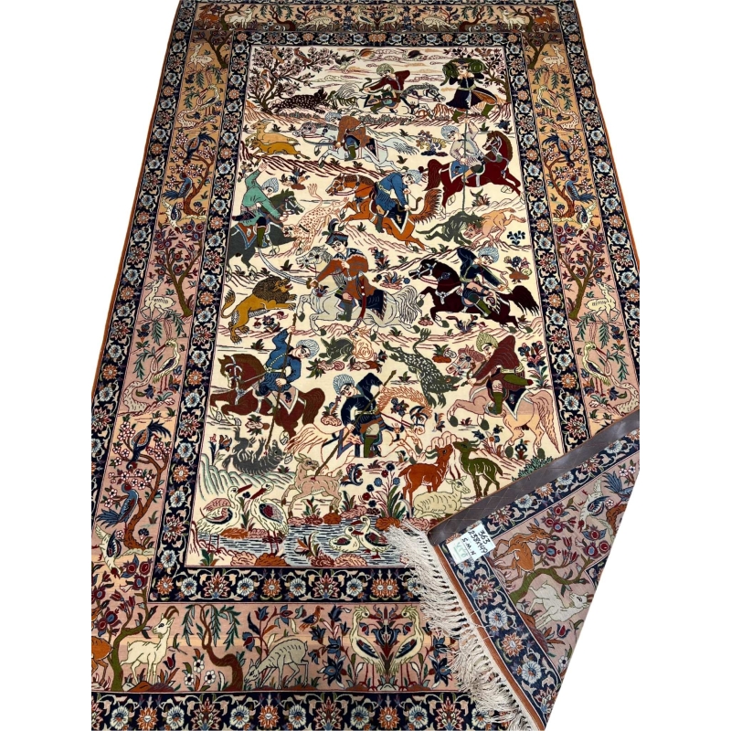"Isfahan rug depicting a traditional hunting scene with wildlife motifs"