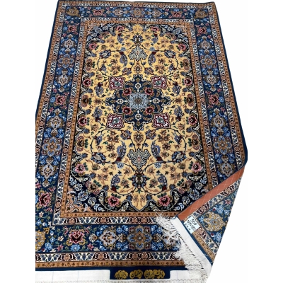 Floral patterned Persian rug with a golden medallion design.