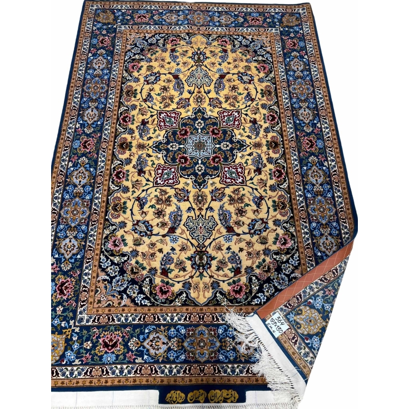 Floral patterned Persian rug with a golden medallion design.