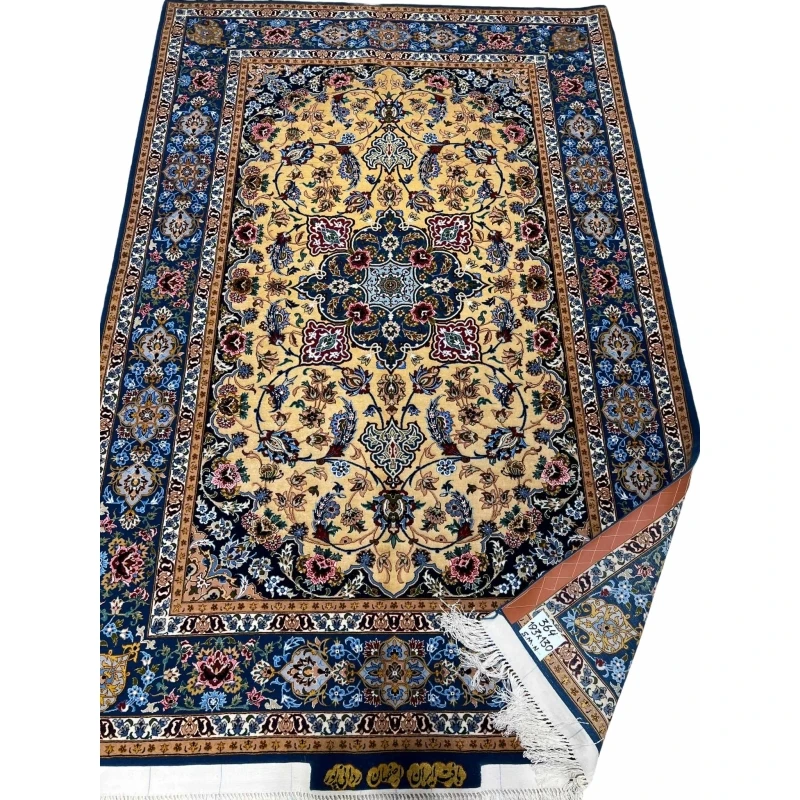 Floral patterned Persian rug with a golden medallion design.