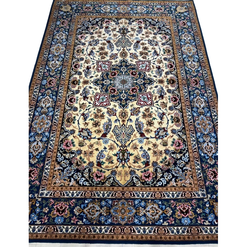 Hand-knotted Isfahan Persian rug with navy blue and golden tones.