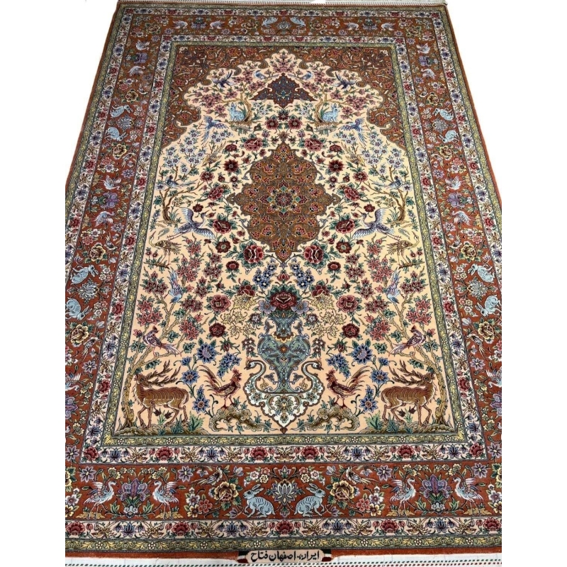 "Luxury Isfahan Persian rug, hand-knotted with silk and wool, featuring wildlife and floral medallion patterns."