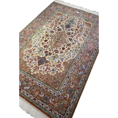 "Collectible Isfahan rug with vibrant natural dyes, fine silk warp, and exquisite Persian craftsmanship."