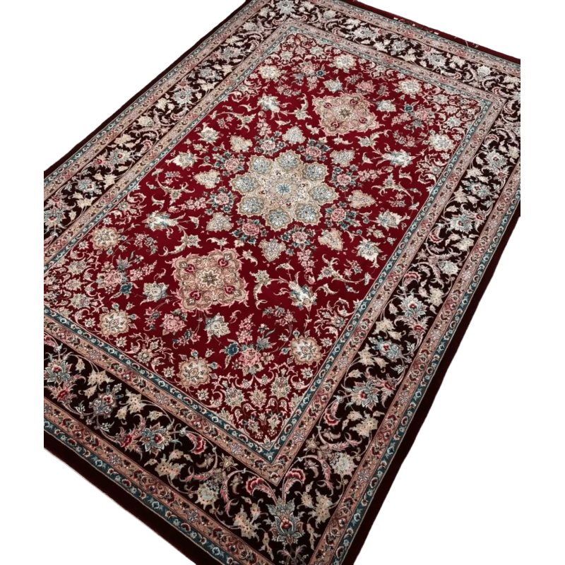 Ornate red and blue design on a traditional Isfahan Persian rug