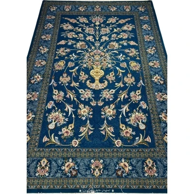 Luxurious hand-knotted Isfahan rug with navy blue floral vase design.
