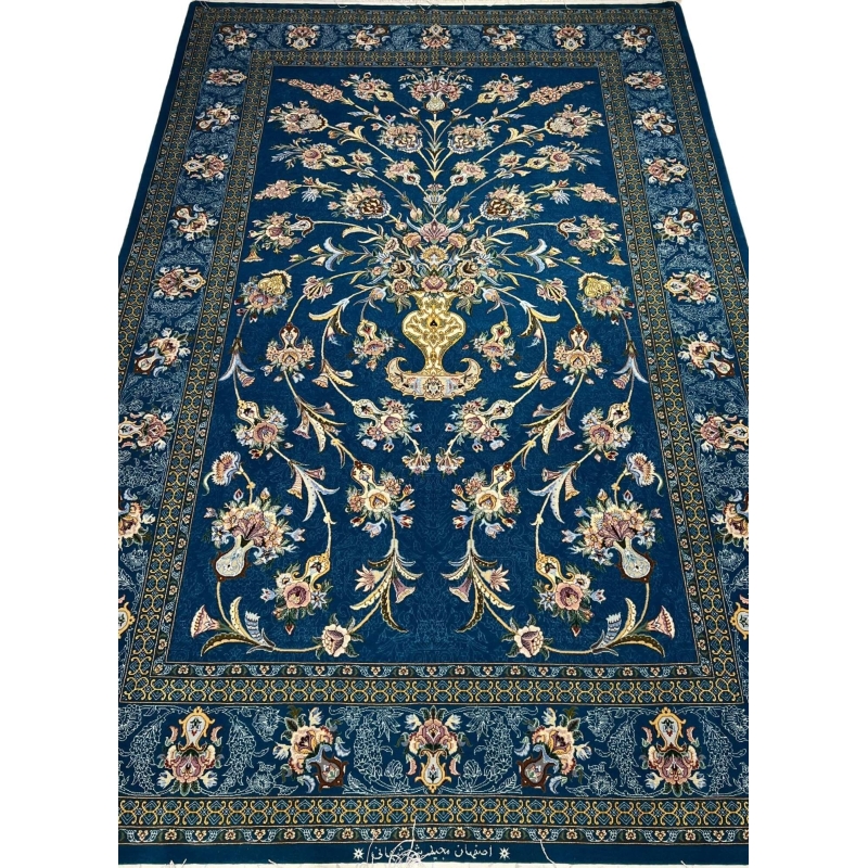 Luxurious hand-knotted Isfahan rug with navy blue floral vase design.