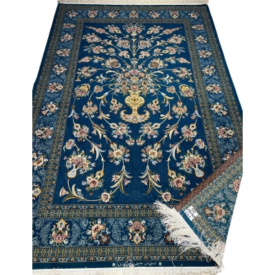Persian wool and silk rug featuring a central floral motif by Shahshani.