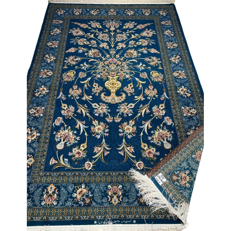 Persian wool and silk rug featuring a central floral motif by Shahshani.
