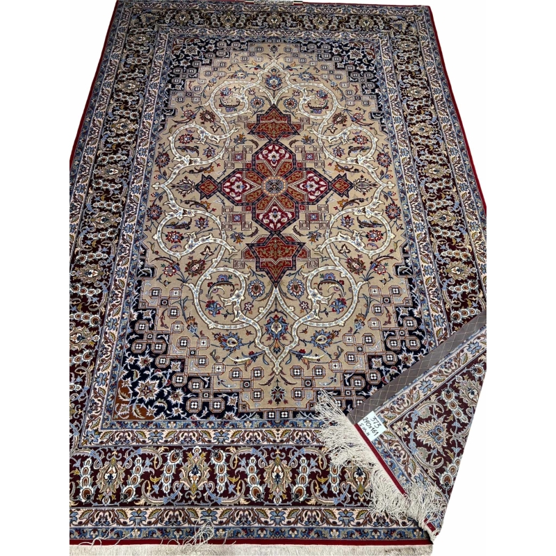 Handwoven Persian rug in beige, burgundy, and navy tones.