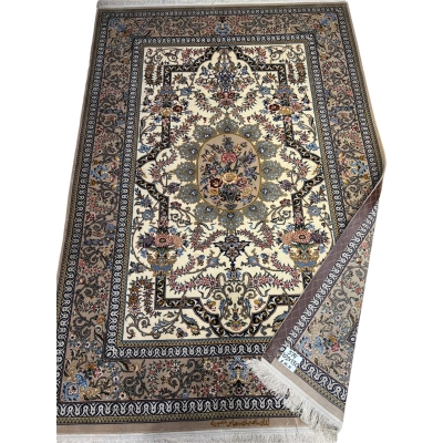 "Elegant Persian wool and silk rug featuring detailed floral patterns, perfect for upscale interiors."