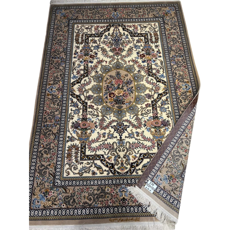 "Elegant Persian wool and silk rug featuring detailed floral patterns, perfect for upscale interiors."