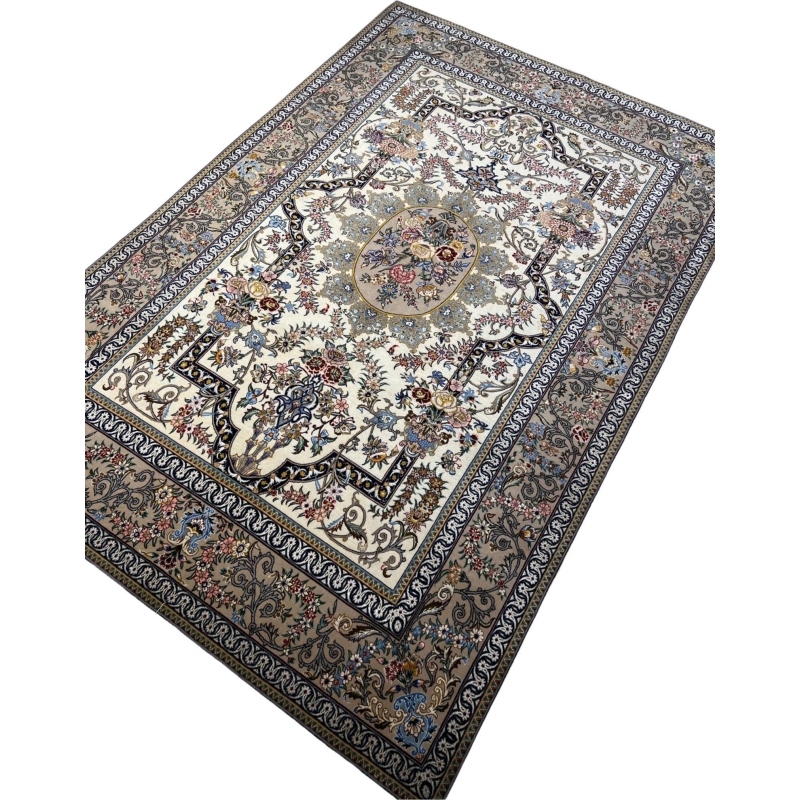 "Isfahan hand-knotted rug with a floral medallion centerpiece and ornate border design."