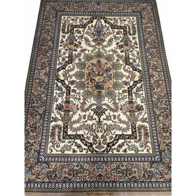 "Hand-knotted Persian rug with intricate floral medallion design, crafted by Mansourie in Isfahan, 200 x 120 cm."
