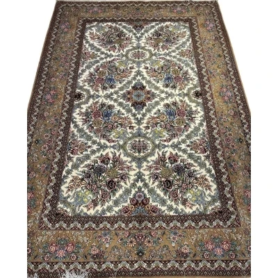 "Hand-knotted Persian carpet in beige and floral design from Isfahan."
