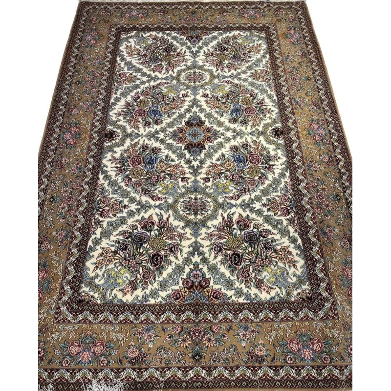 "Hand-knotted Persian carpet in beige and floral design from Isfahan."