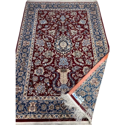 Premium dark red Persian rug with detailed floral artwork on display