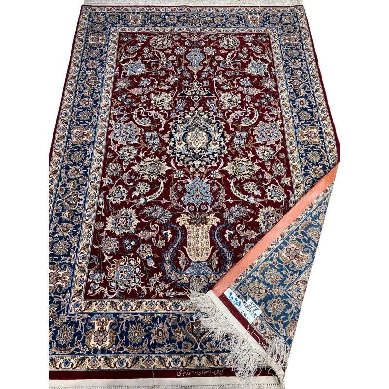 Premium dark red Persian rug with detailed floral artwork on display