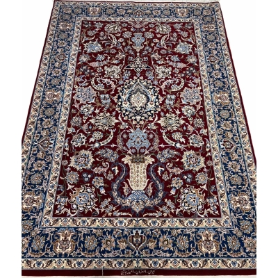 Elegant dark red Persian carpet with traditional motifs available