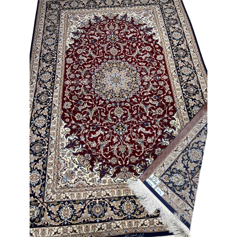 Luxury hand-knotted wool and silk Isfahan carpet.