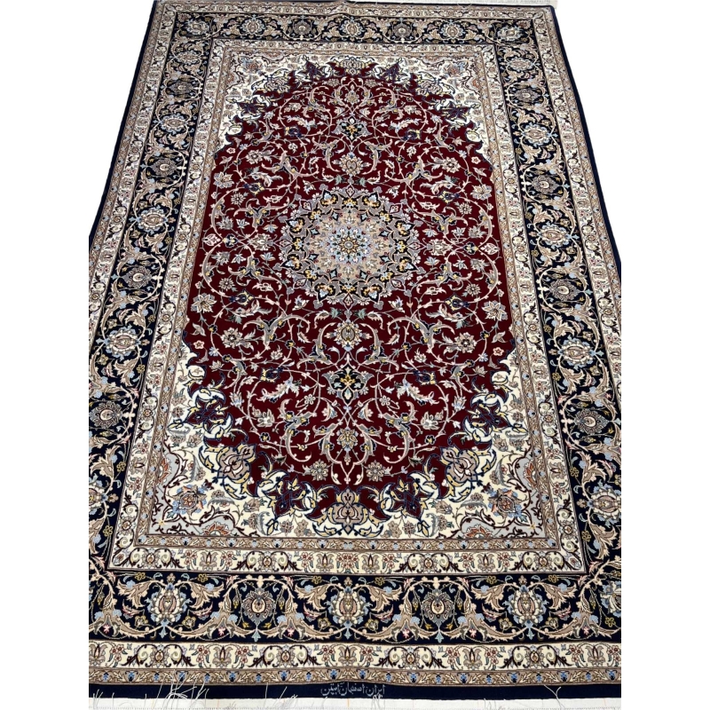 Persian Isfahan rug with deep crimson red and ivory floral design.