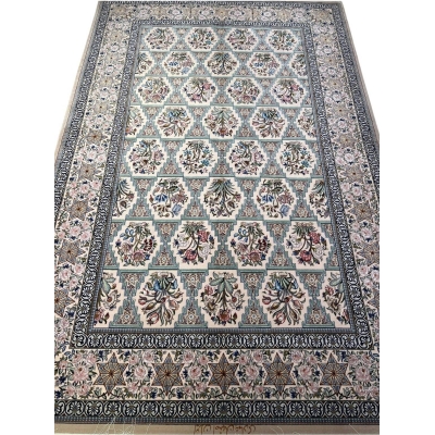 "Intricate beige Isfahan Persian rug with centuries-old design motifs"