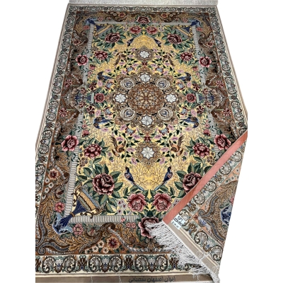 Hand-knotted wool and silk Persian carpet with intricate details.