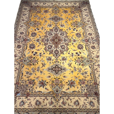 Spacious oriental-inspired silk rug in shades of gold and beige