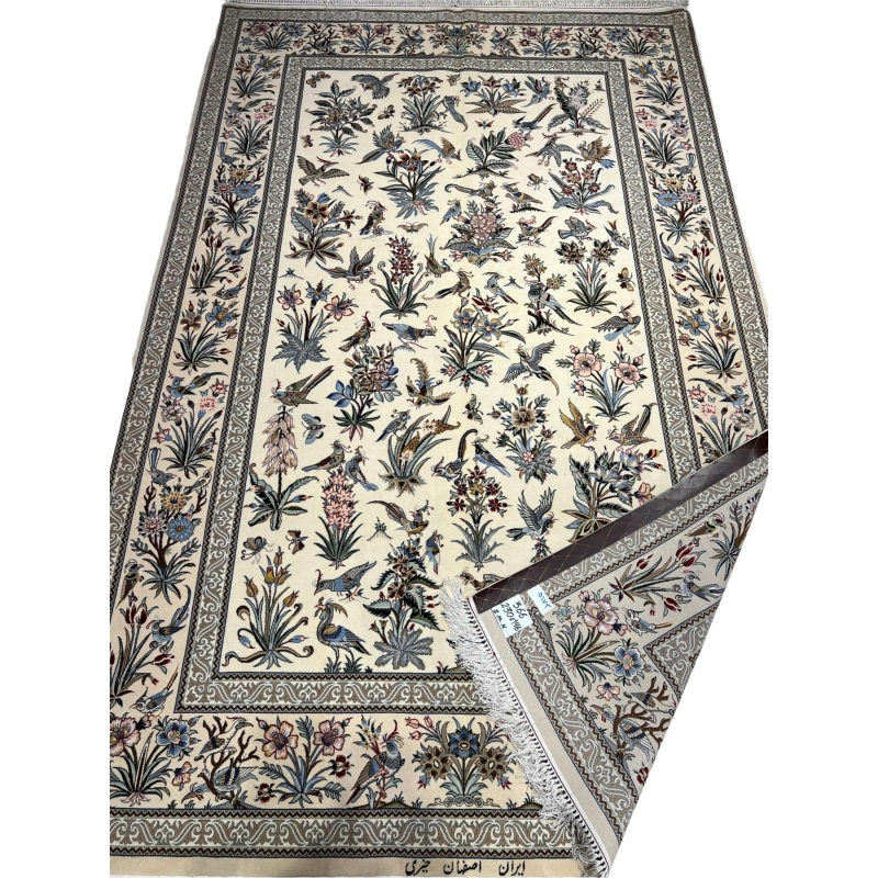 "Authentic Persian floral rug with intricate botanical and bird motifs, handwoven in Isfahan, Iran."