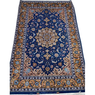 "Authentic handcrafted Persian rug from Isfahan with intricate floral and geometric patterns."