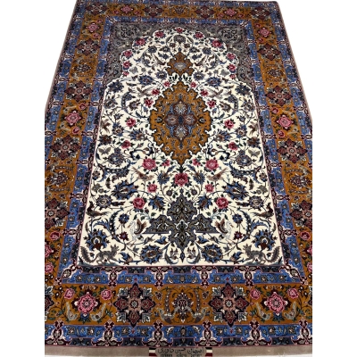 Vintage Isfahan Persian rug with a golden medallion and floral motifs.
