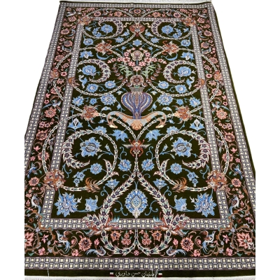 Persian Isfahan floral vase rug with emerald-green base.