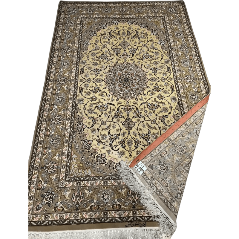 Close-up of New Isfahan Rug showcasing its detailed gold and beige 810,000 knot design