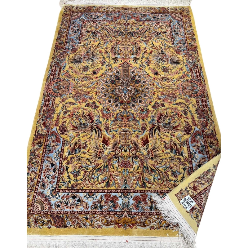 "Luxury Persian carpet with an elaborate golden and burgundy medallion design, hand-knotted in Isfahan, Iran."