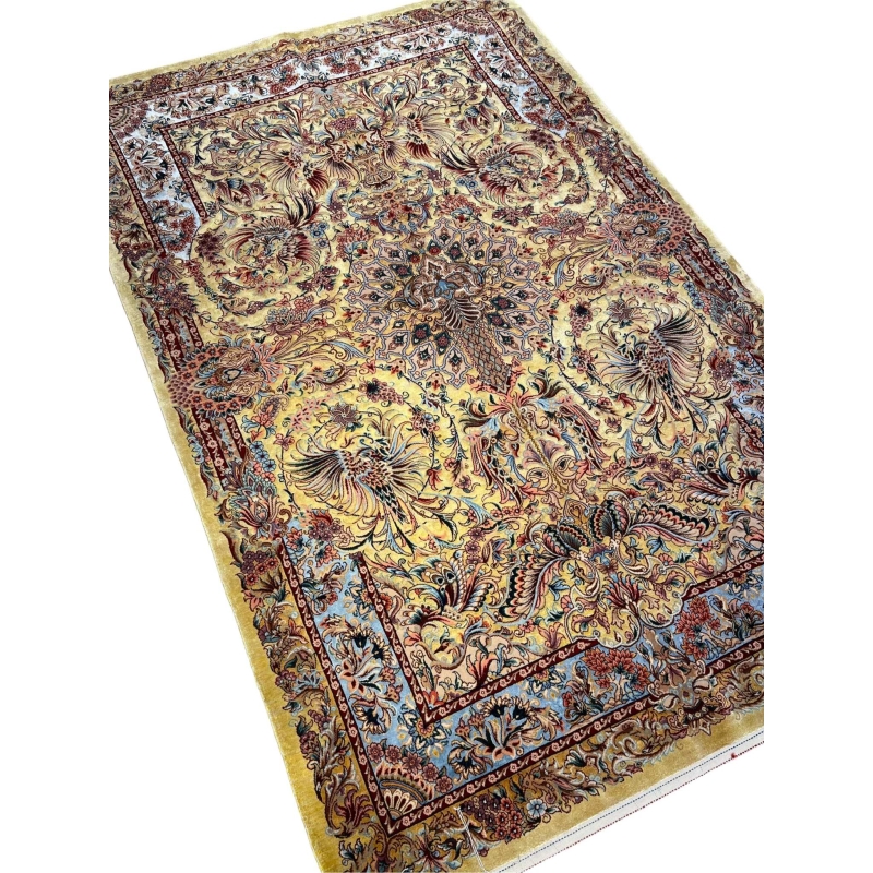 "Authentic Persian wool and silk rug featuring a phoenix and floral motif, ideal for elegant interiors and collectors."