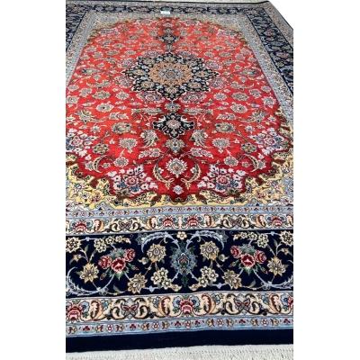 Close-up of the intricate medallion design on Persian rug by Jafar Fakhforie