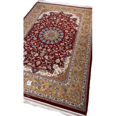"Authentic Persian floral rug with an intricate medallion pattern, handwoven in Isfahan, Iran."
