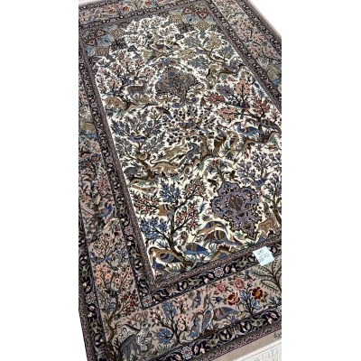 "Traditional Persian hand-knotted carpet with intricate animal motifs, floral patterns, and a luxurious silk warp."