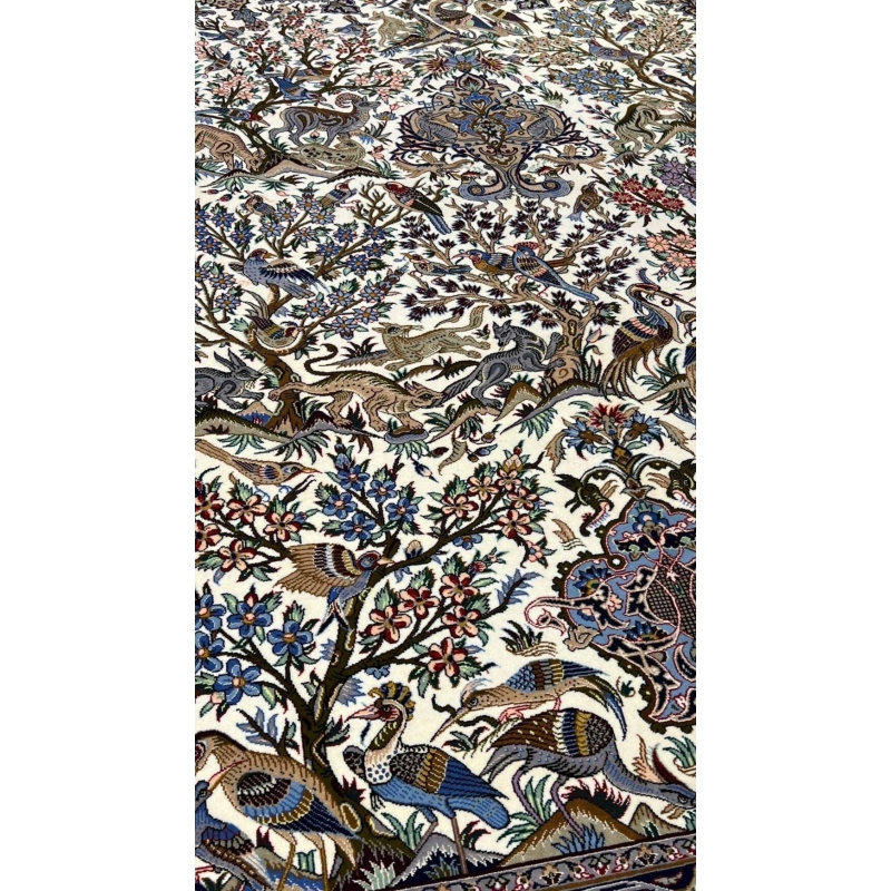 "Exquisite Persian carpet from Isfahan, featuring a classic hunting design, intricate hand-knotting, and luxurious silk accents."