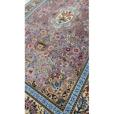 "Luxurious wool and silk Persian rug with exquisite floral details, perfect for sophisticated interiors."