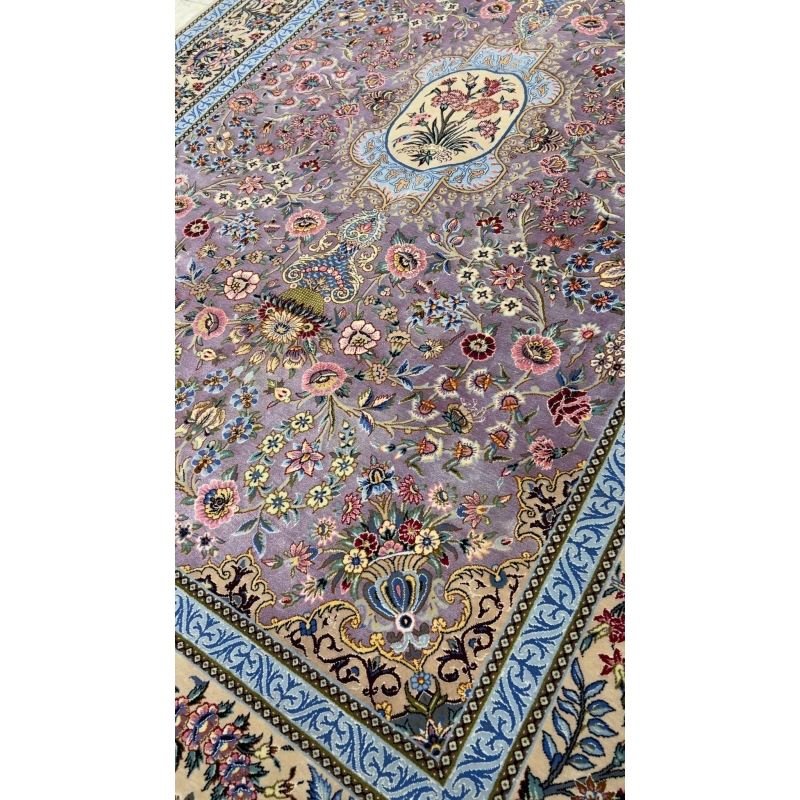 "Luxurious wool and silk Persian rug with exquisite floral details, perfect for sophisticated interiors."