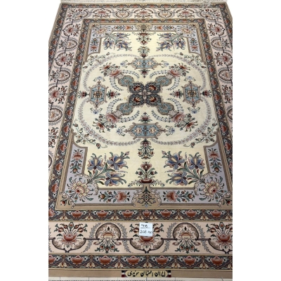 "Persian Isfahan rug with intricate floral and geometric patterns, hand-knotted by Master Moaeedie in silk and wool."