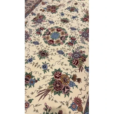 "Elegant handmade Persian rug from Isfahan, crafted with silk warp and wool-silk pile, showcasing intricate floral motifs, sized at 170 cm x 110 cm for luxurious home decor."