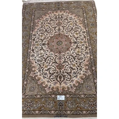 "Luxury Persian rug with wool and silk blend, showcasing intricate arabesque patterns."
